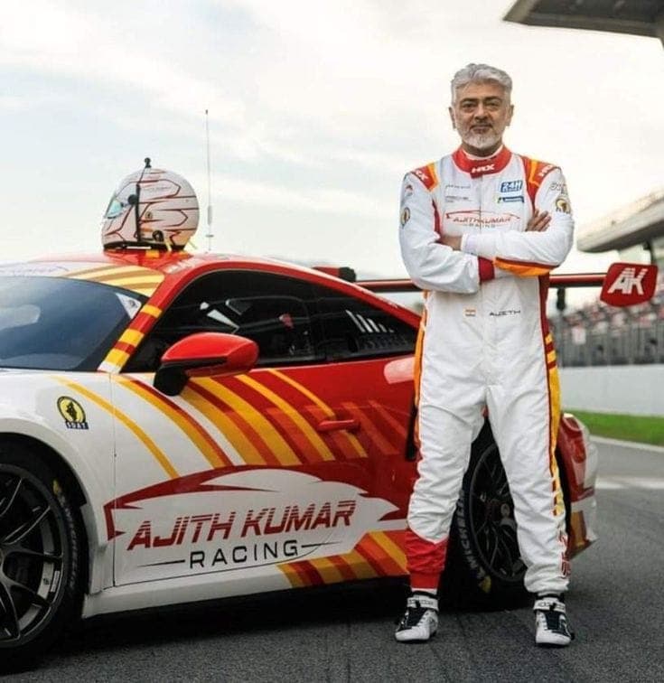 Ajith Kumar with #901 Porsche 911 GT3 Cup racecar in the international endurance paddock