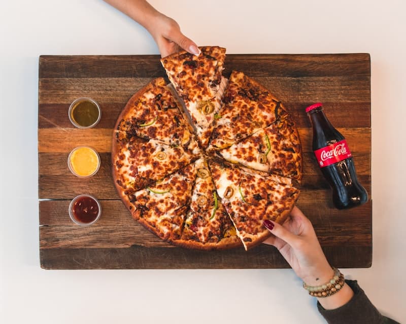 Chicken Mutka Pizza served fresh at The Wheels Turbo Cafe in RS Puram Coimbatore